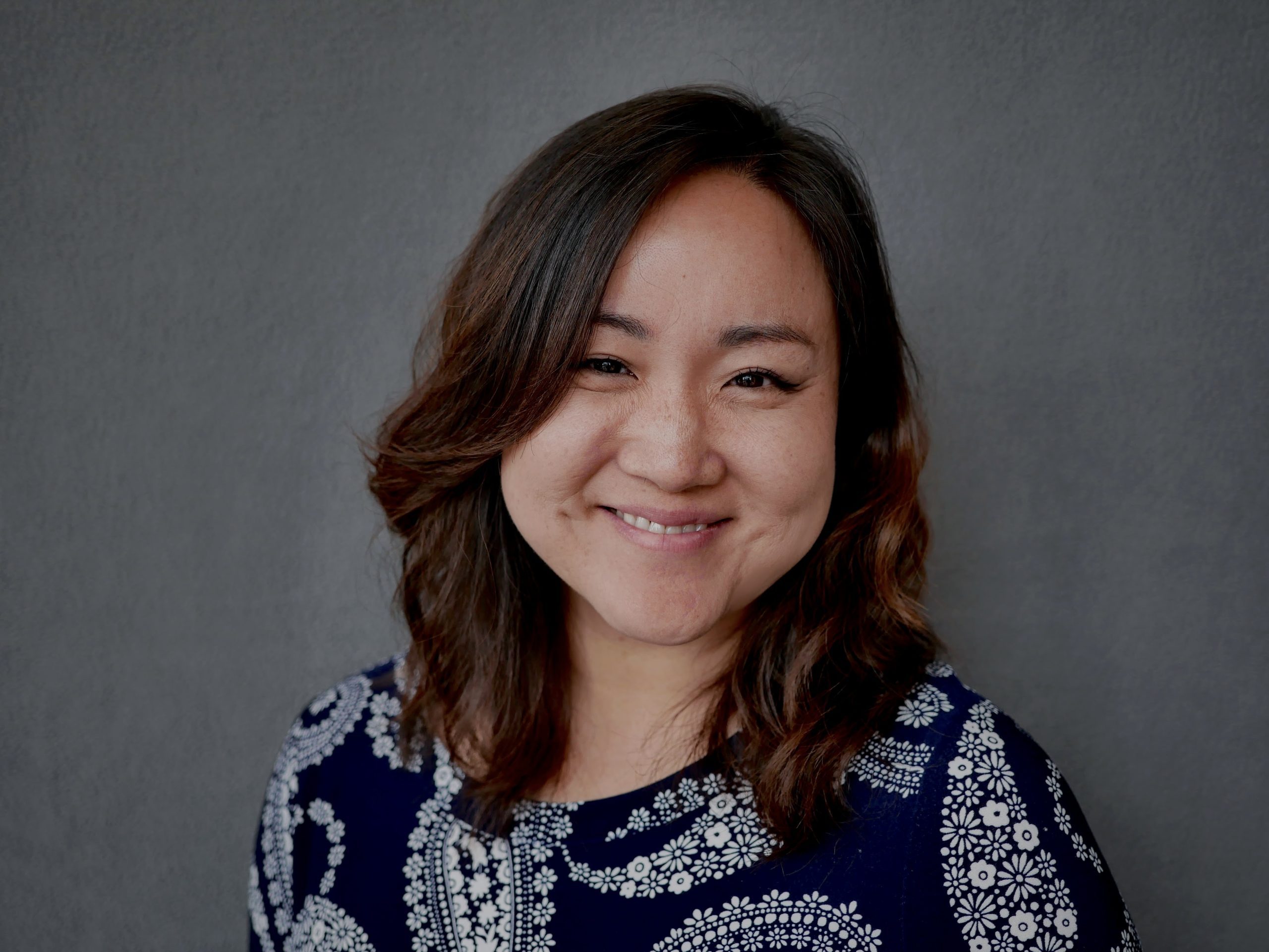 Headshot of a Remitly team member talking about how they embody the company’s cultural values.